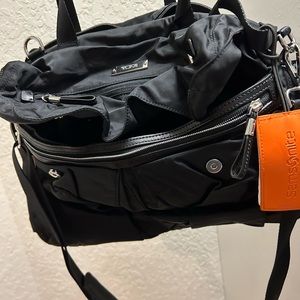 Tumi black carryon duffel